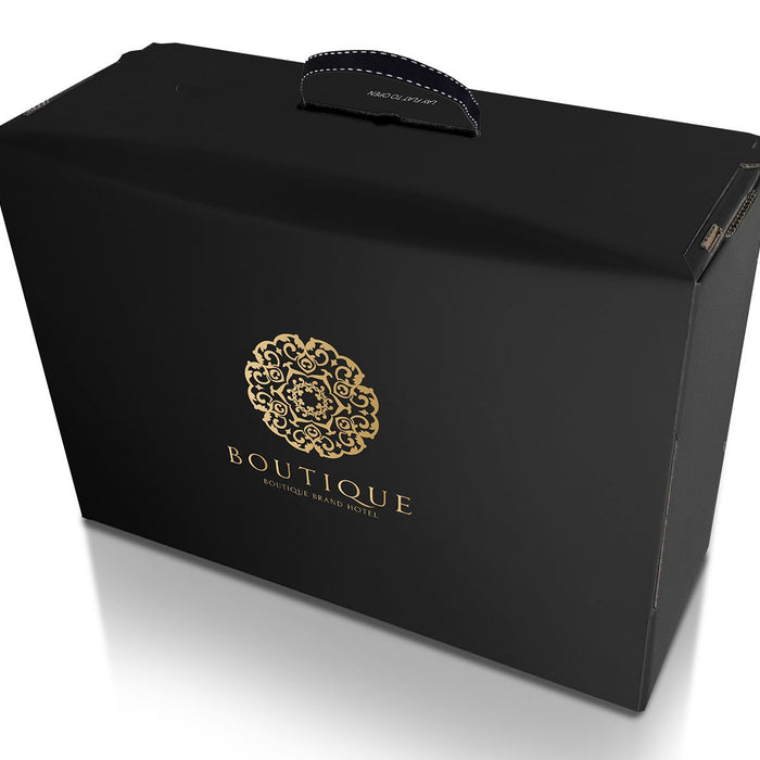High end luxury packaging for premium brands. Gold embossed on silk black, with cotton carry handle and unique fifth corner design. Manufactured in the UK